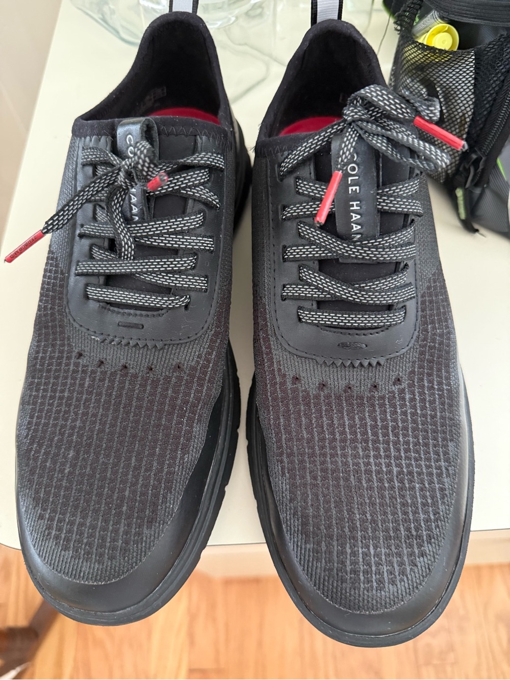 Cole Haan Men’s Black Knit Athletic Sneakers with Red Accents